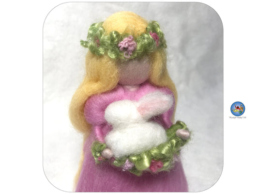 Spring  Waldorf inspired fairy/angel with rabbit and pink dress. Ostara goddess. Eostre.