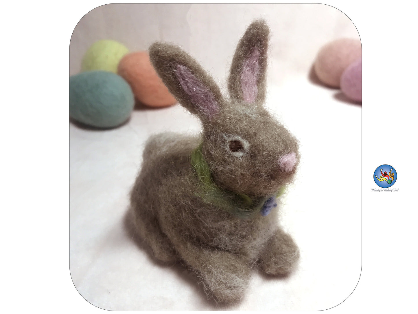 Needle felted Easter Bunny figurine in light brown wool. Ostara decoration. Waldorf inspired felted animal.